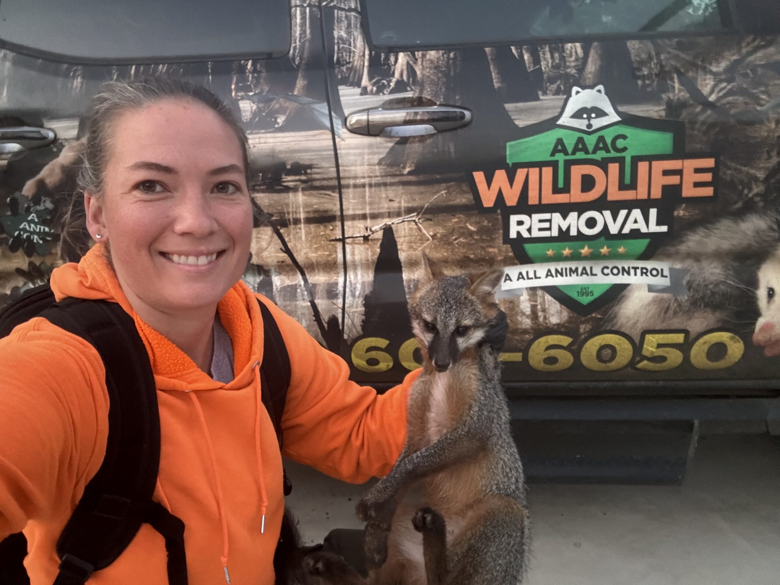 Christie Steele with AAAC truck and wildlife